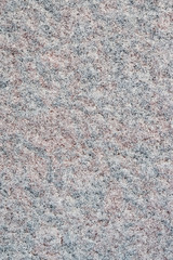 Christmas and new year background. The texture of the snow on the granite.