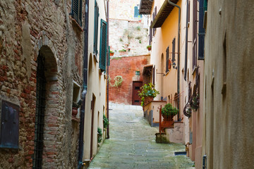 Fototapeta premium Montepuliciano old city characteristic medieval narrow street, Tuscany, Italy