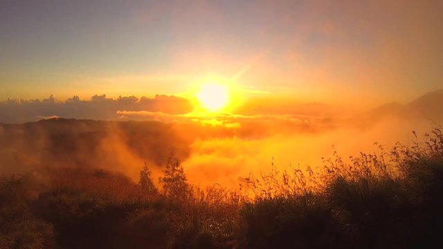 Eruption Sunset on Mountain Agung Volcano at Bali, Indonesia. HD, Time lapse.