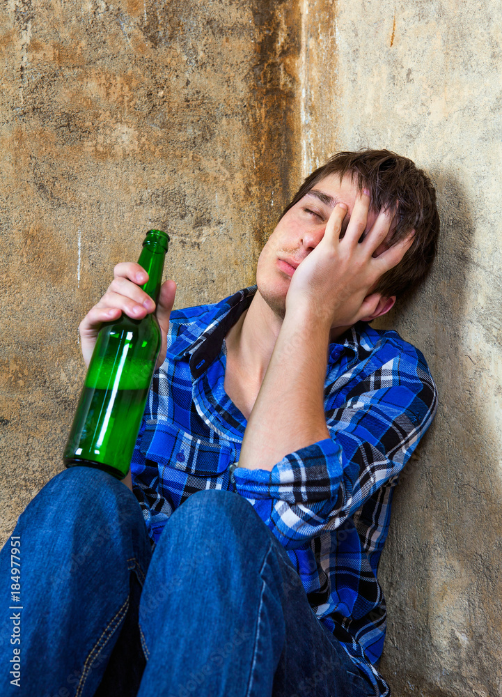 Canvas Prints sad young man with a beer