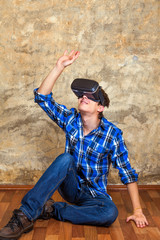 Young Man in VR Glasses