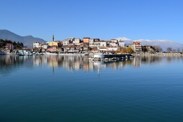 Naklejka na ściany i meble Eğirdiris the name of a lake and of the town situated on the shore of that lake (Eğirdir) in Turkey. The lake lies in the Turkish Lakes Region and is 186 kilometers (116 mi) north of Antalya. 