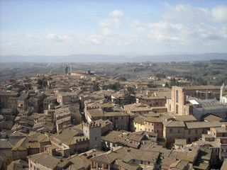 Scenery of Siena, a beautiful medieval town in Tuscany, with view of the Dome & Bell Tower of Siena Cathedral (Duomo di Siena)