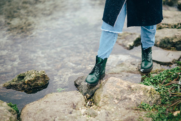 Girl enjoying the view of the frozen lake or river.