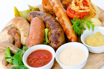 various sausages with various sauces