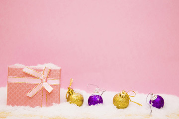 Christmas postcard with gift box and balls