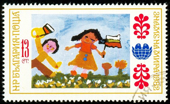 UKRAINE - circa 2017: A postage stamp printed in Bulgaria shows children's drawing, holiday, Series International Children's Assembly Banner of Peace, circa 1982