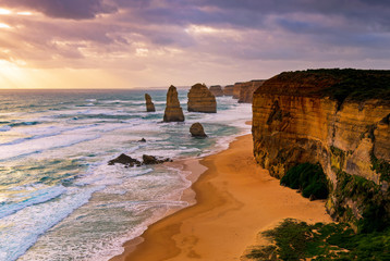 Sunset over Twelves Apostles in Great Ocean Road, Victoria, Australia. The Twelve Apostles is a...