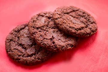 chocolate chip cookies on a red background