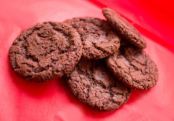chocolate chip cookies on a red background
