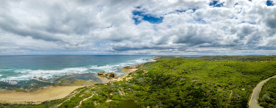 Super wide panoramic view of the Mornington Peninsula in Australia. The London bridge is in the centre of the image.