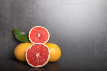 grapefruit on a grey stone table