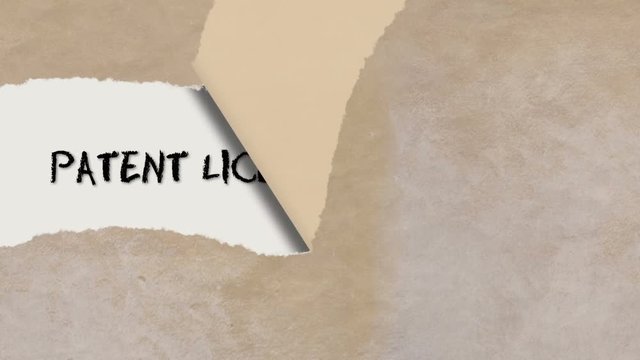 concept animation of torn paper with words  Patent license  agreement.