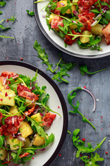 Fresh crispy Bacon, Potato salad with green vegetable on plate