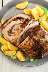 Roasted pork roll stuffed with other meat