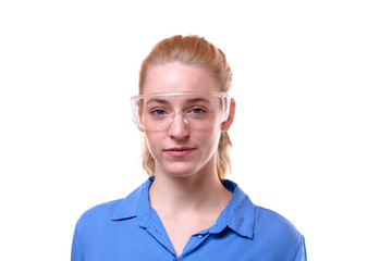 Portrait of young woman wearing safety glasses