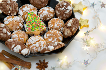 Chocolate Christmas Cookies with decoration and fir tree isolated.