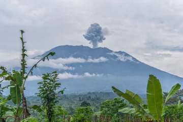 Cercles muraux Volcan Agung volcano eruption view near rice fields, Bali, Indonesia