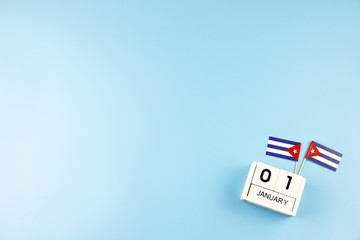 Fototapeta na wymiar JANUARY 1 Wooden calendar Concept independence day of Cuba and Cuba national day with space for your text.