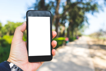 hand on smartphone Concept travel on vacation