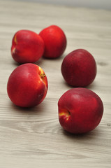 Nectarines on a table with shallow dept of field