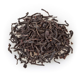 Heap of dried black tea isolated on white background