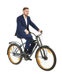 Obraz premium Young handsome businessman with bicycle on white background