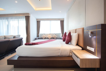 Luxury Interior design in bedroom of pool villa with cozy king bed