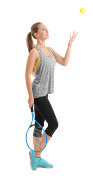 Young woman with tennis racket and ball on white background