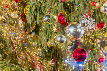 Christmas decorations on Christmas tree, balls, boxes
