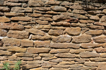 The old bricks of castle wall or ancient ruins. Background