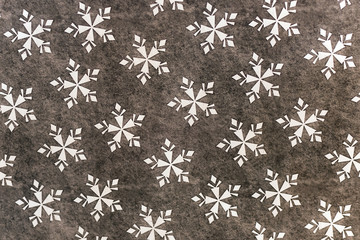 Christmas styled texture ornament with red and white snowflakes.