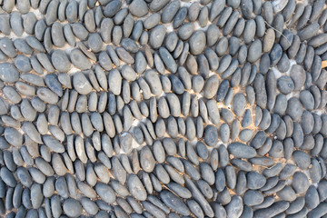 Decorative pavement of stones fixed in cement