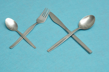 Knife, fork, teaspoon and dessert spoon