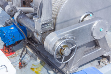 Engines to handle fishing nets on a boat