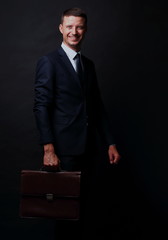 Full body business man  with briefcase