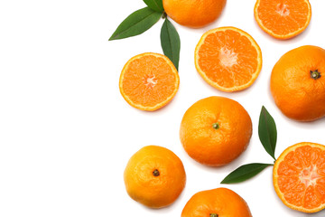 mandarin with slices and green leaf isolated on white background top view