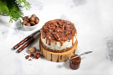 Christmas cheesecake with pecans and caramel sauce