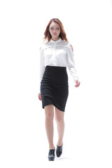 Fototapeta premium Successful business woman walking - isolated over white