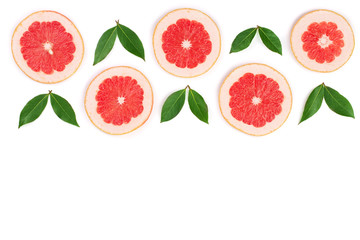 Grapefruit slices with leaves isolated on white background with copy space for your text. Top view. Flat lay pattern