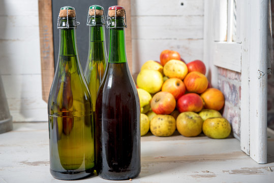 bottles of cider and apples of normandy