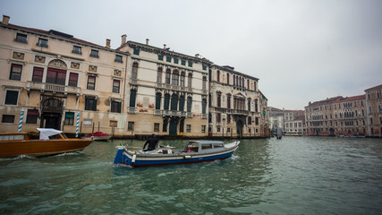Obraz na płótnie Canvas Famous palaces on the Grand Canal in Venice, Italy. Moisture