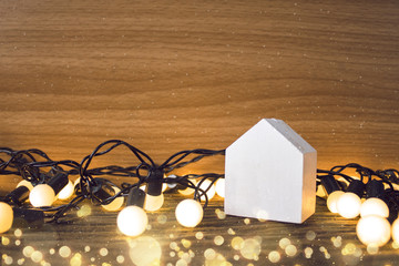 home with bokeh light in christmas concept