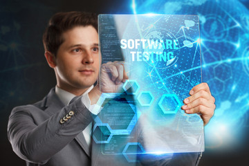 Business, Technology, Internet and network concept. Young businessman showing a word in a virtual tablet of the future: Software testing