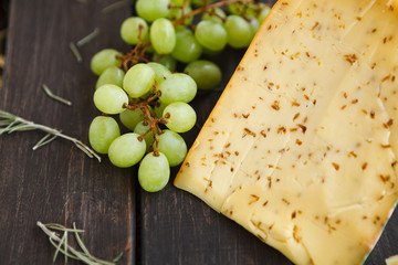 Gouda cheese with herbs closeup