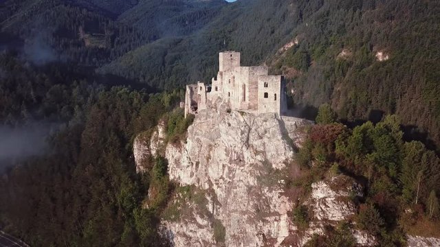Flying around abandoned clifftop Strecno castle, Slovakia.
