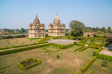 Cenotaphs at Orchha, Madhya Pradesh. Also spelled Orcha, famous travel destination in India. Moghul gardens, blue sky.