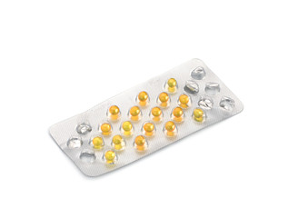 Pills on white background