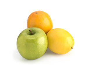 Green apple and yellow lemons on a white background