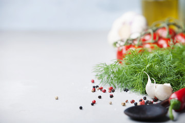 Fresh vegetables over concrete background